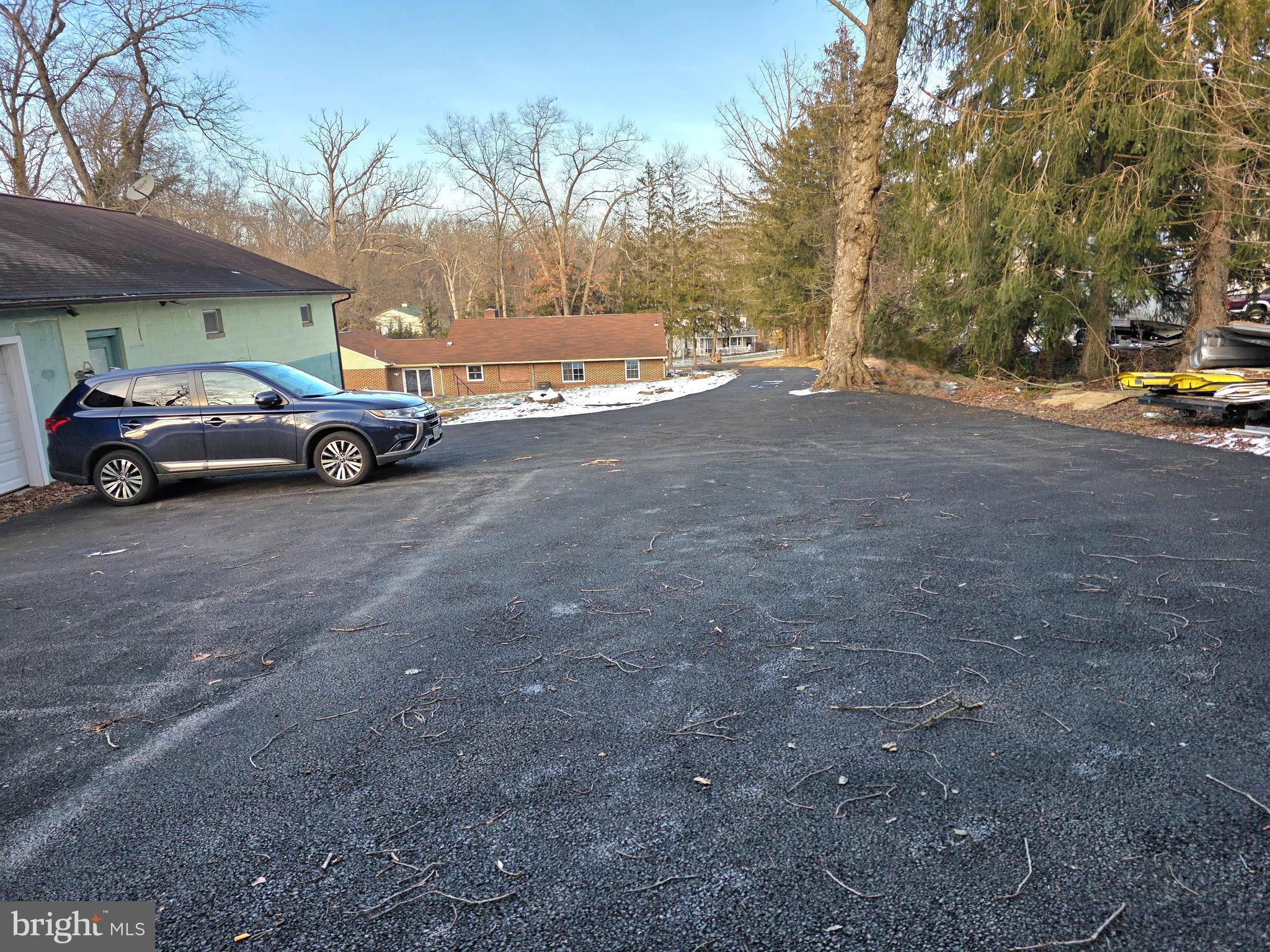 5662 Gunpowder Road White Marsh, MD 21162 - Photo 35 of 37 a view of a cars parked on the side of a street
