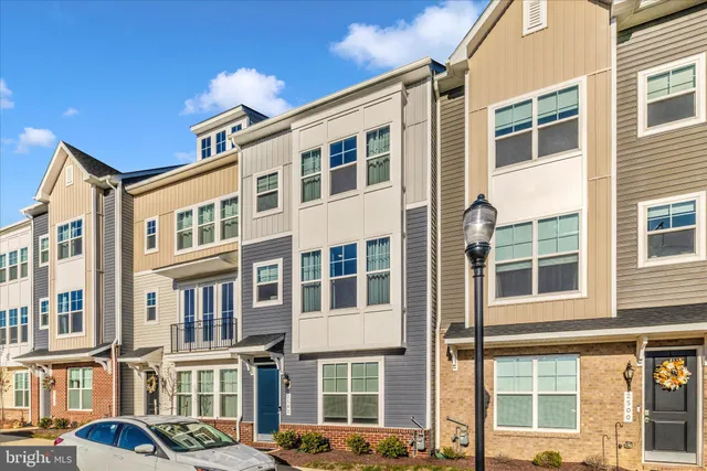 a front view of a building with glass windows