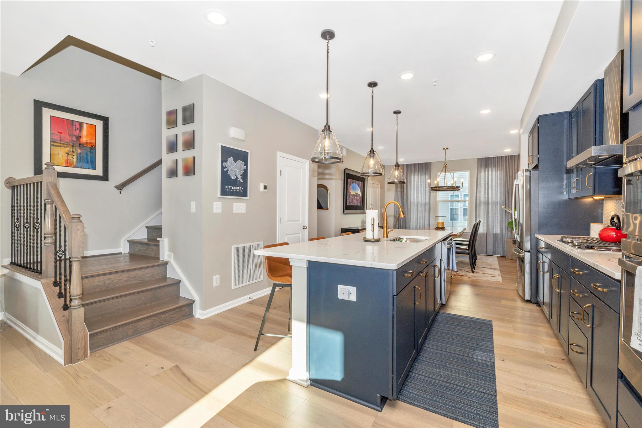 2502 Rucker Lane Frederick, MD 21701 - Photo 22 of 60 a kitchen with stainless steel appliances granite countertop a sink and a stove