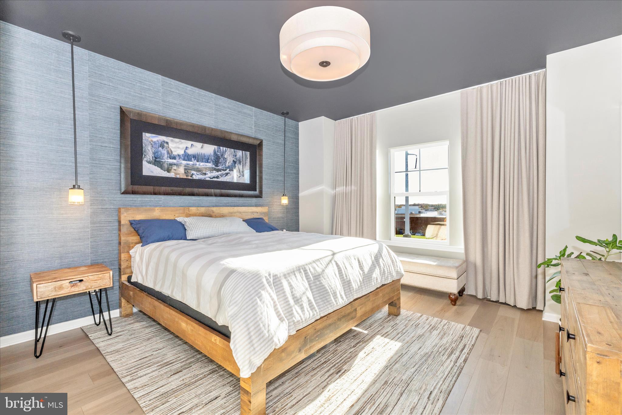 2502 Rucker Lane Frederick, MD 21701 - Photo 32 of 60 a bedroom with a bed and a large window