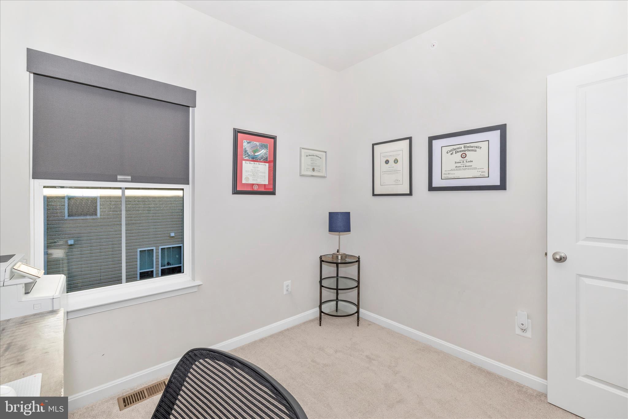 2502 Rucker Lane Frederick, MD 21701 - Photo 42 of 60 a view of an empty room with a window