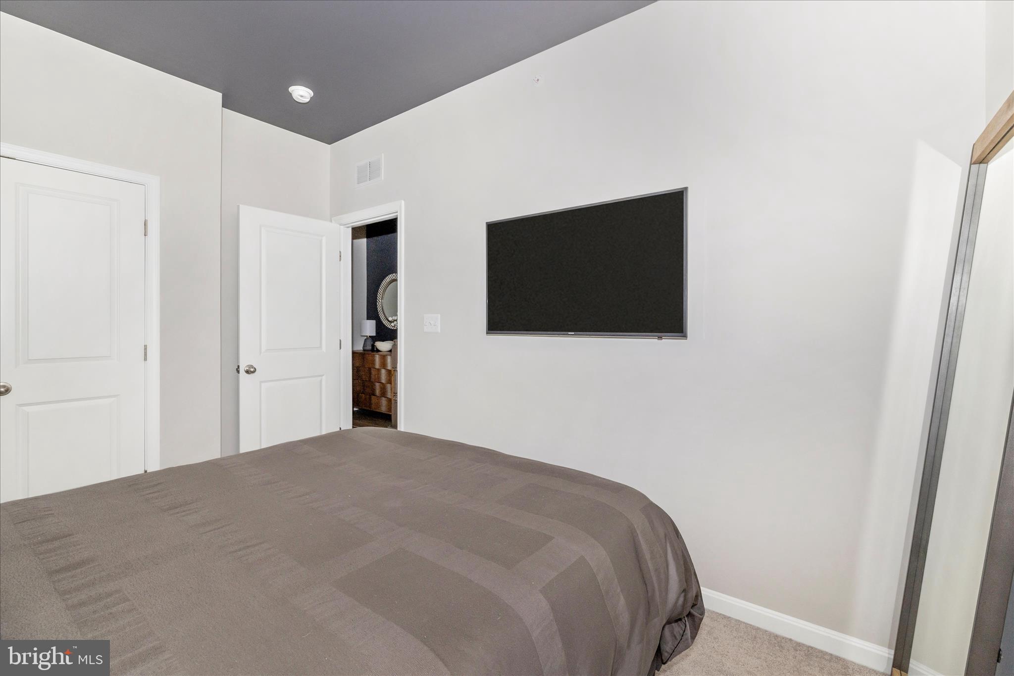 2502 Rucker Lane Frederick, MD 21701 - Photo 45 of 60 a view of a livingroom with a flat screen tv