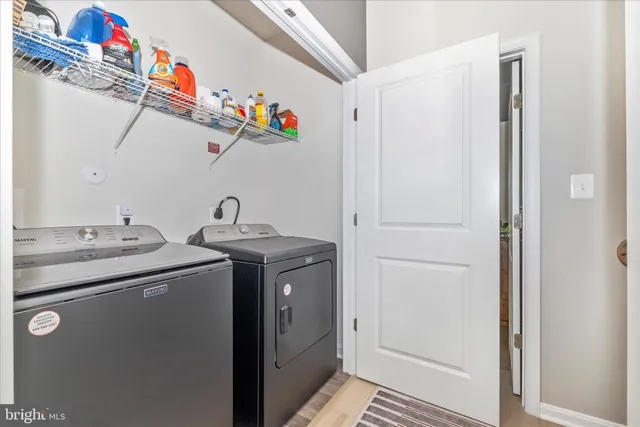 a front view of a building with garden