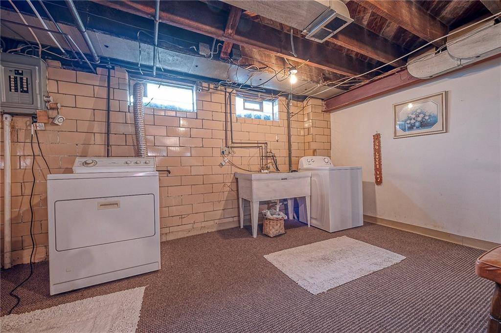 699 Kaye Avenue Monaca, PA 15061 - Photo 27 of 43 a view of a storage & utility room with washer and dryer
