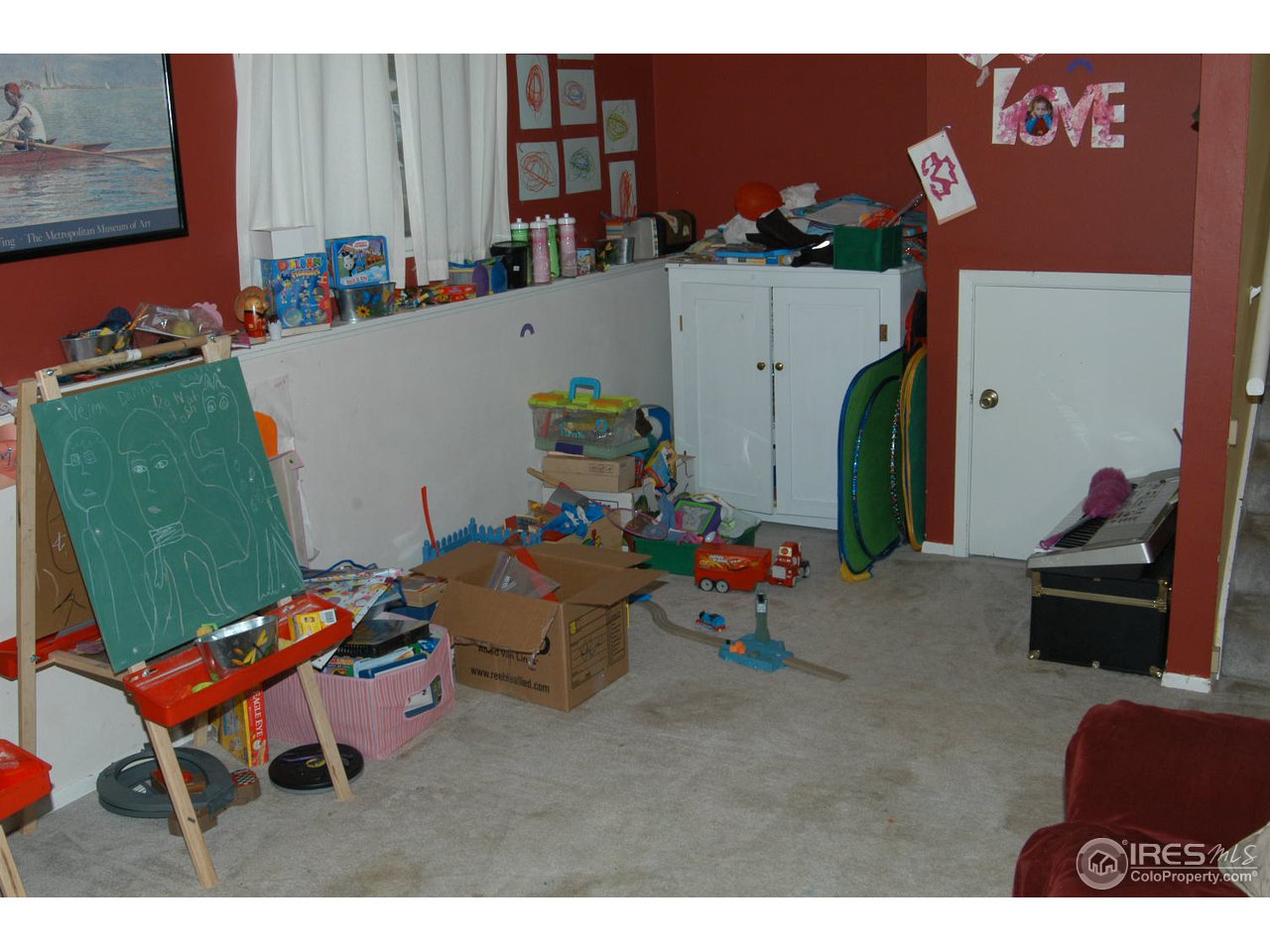 4655 Macky Way Boulder, CO 80305 - Photo 10 of 18 a play room with furniture and a flat screen tv