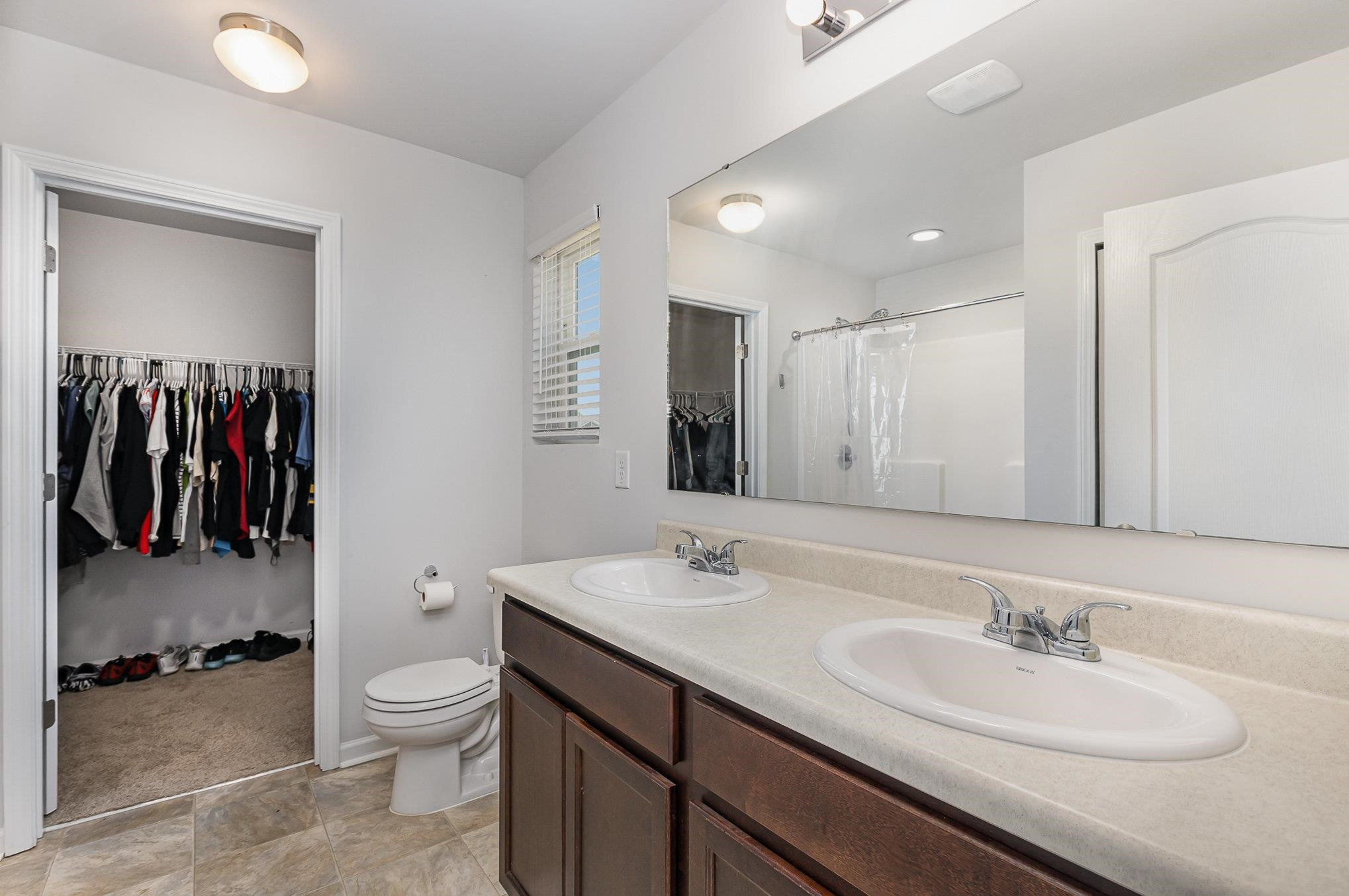 226 Hallow Oak Street Spring Lake, NC 28390 - Photo 17 of 30 a bathroom with a sink and a toilet