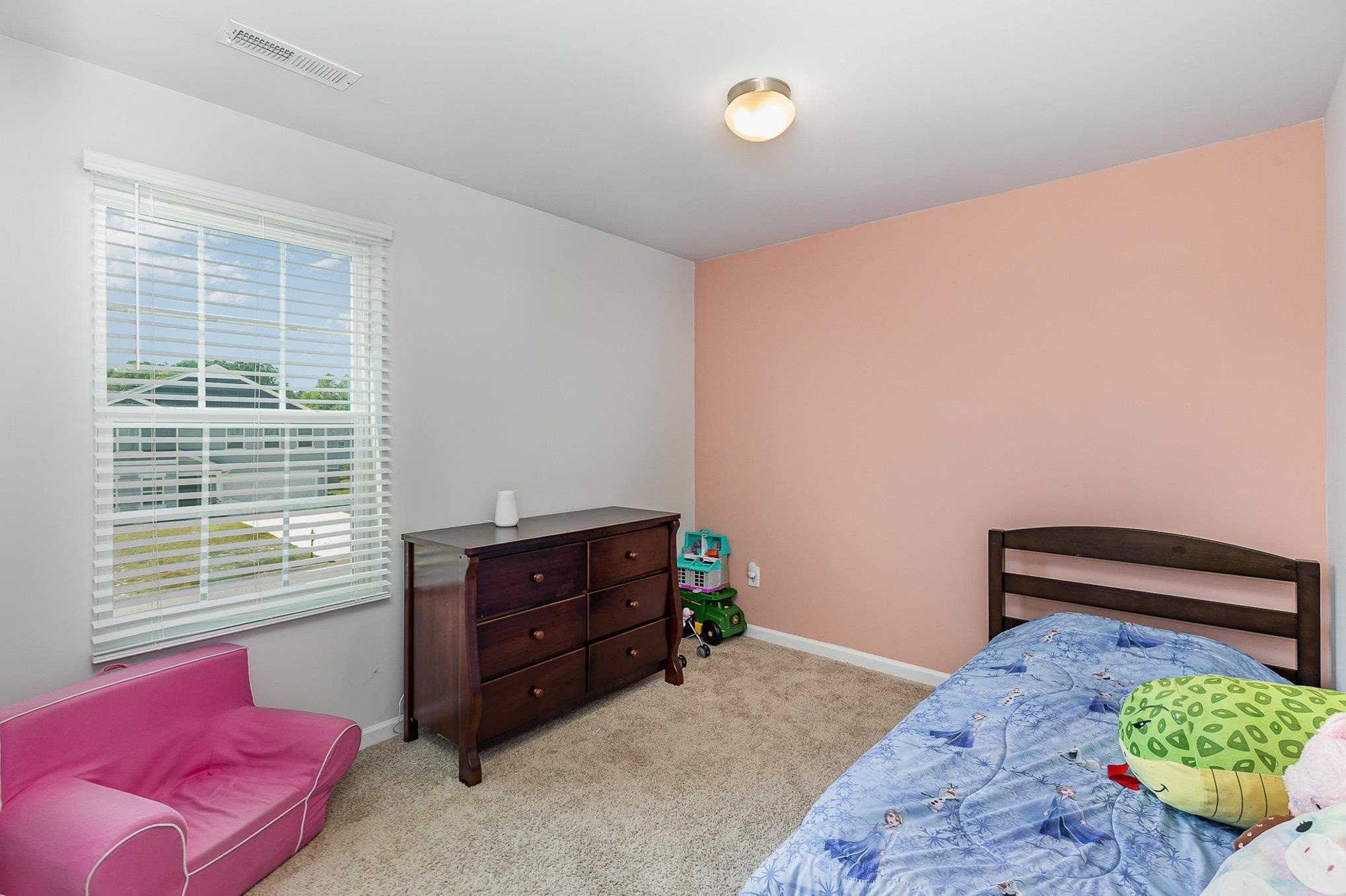 226 Hallow Oak Street Spring Lake, NC 28390 - Photo 20 of 30 a living room with furniture and a window