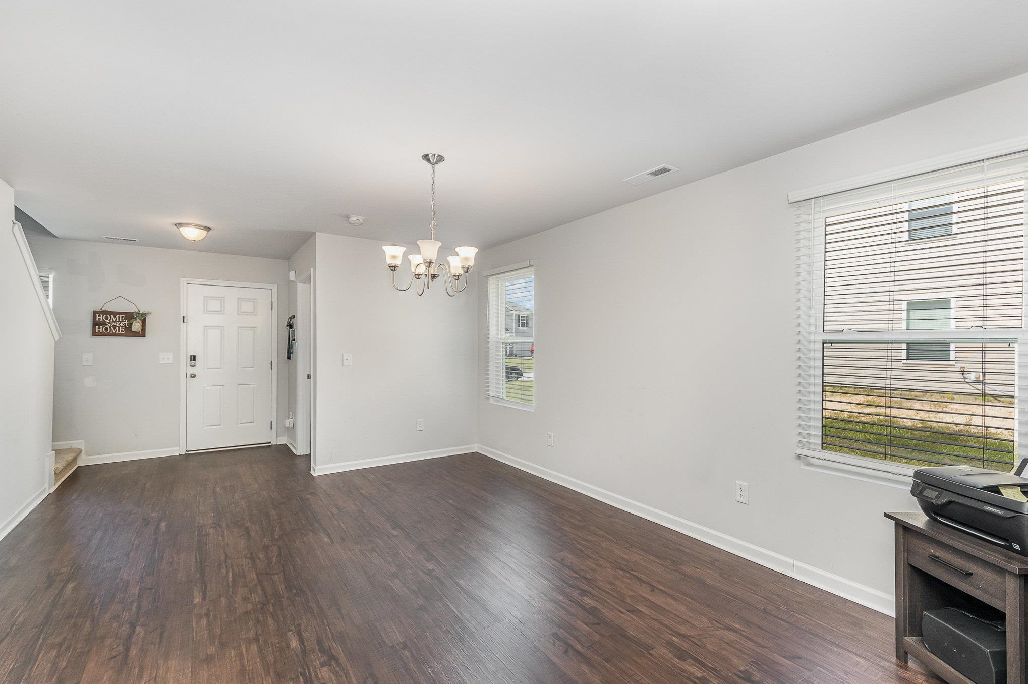 226 Hallow Oak Street Spring Lake, NC 28390 - Photo 27 of 30 wooden floor in an empty room with a window