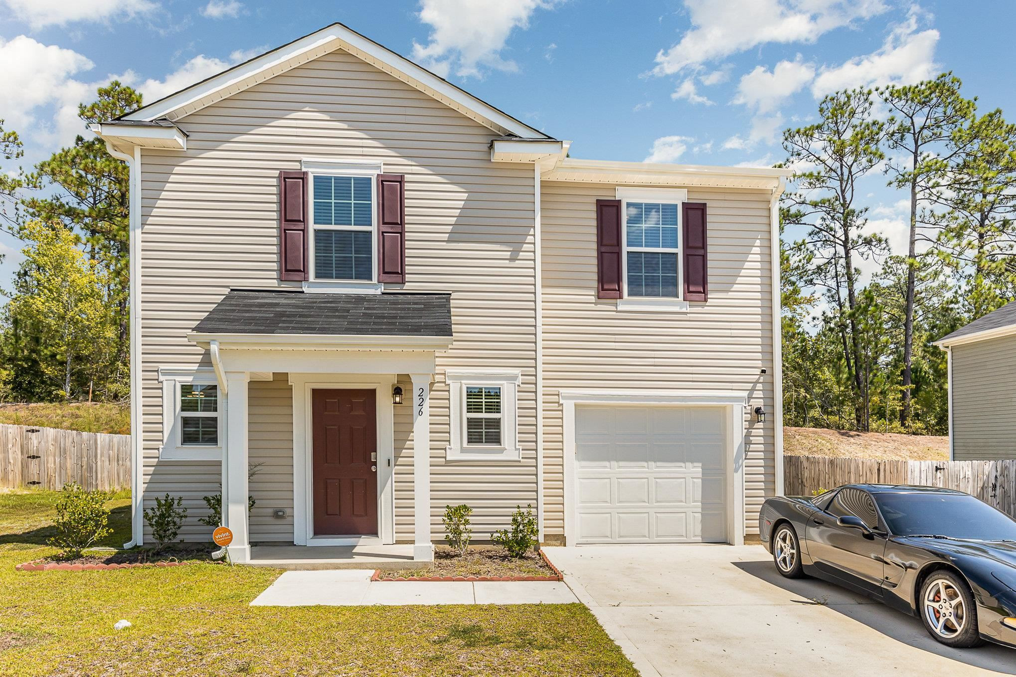 226 Hallow Oak Street Spring Lake, NC 28390 - Photo 4 of 30 a view of a house with a patio