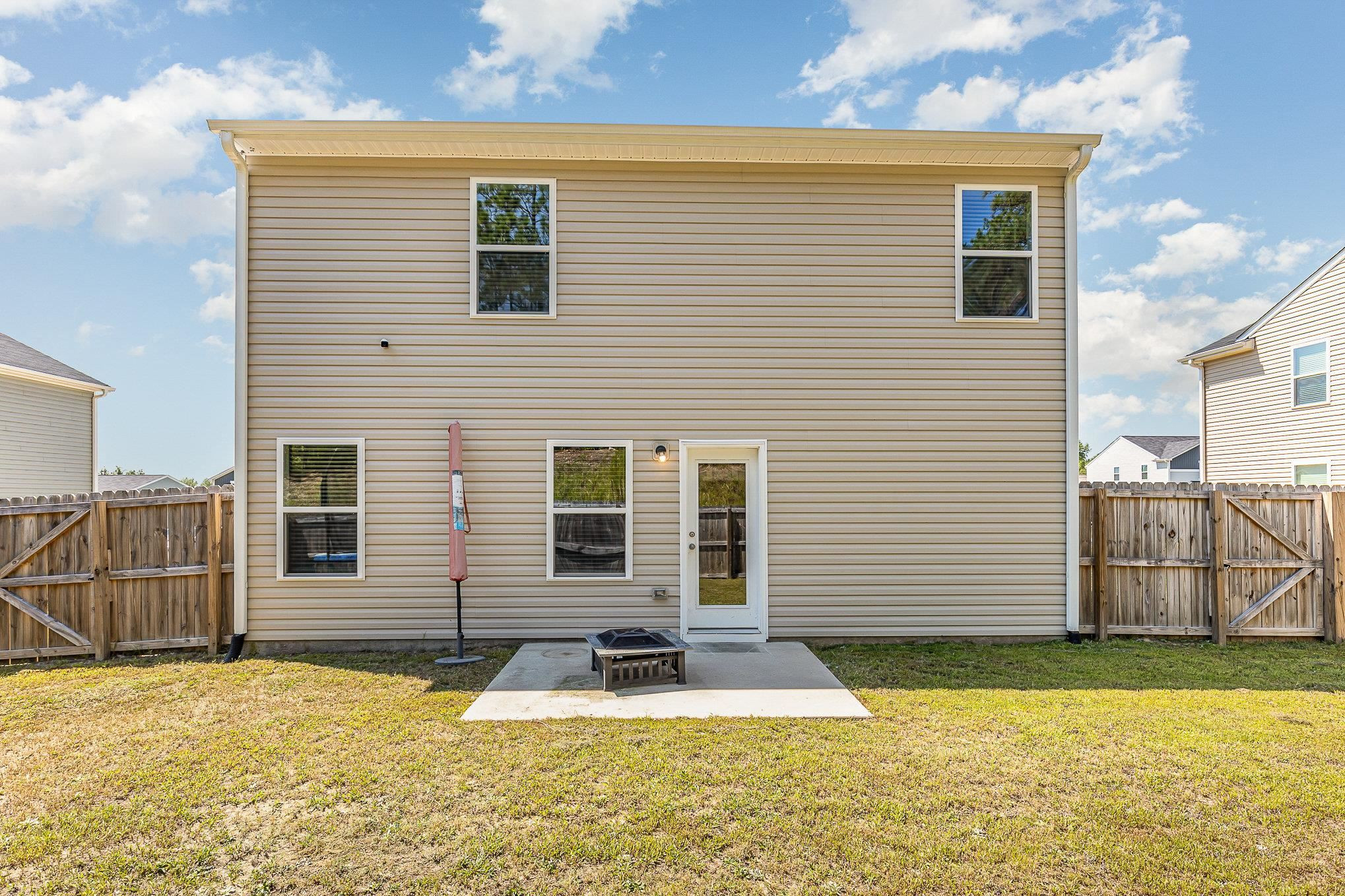 226 Hallow Oak Street Spring Lake, NC 28390 - Photo 6 of 30 a front view of a house with a yard