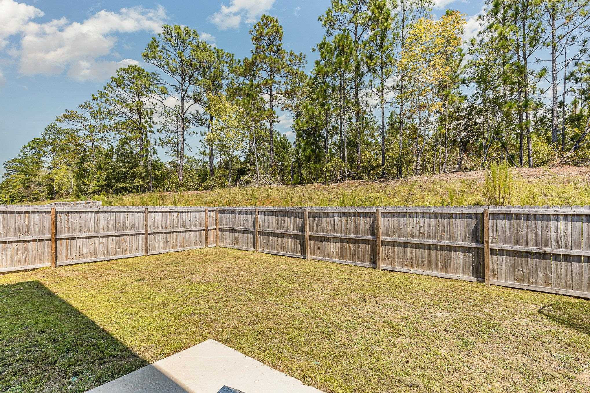 226 Hallow Oak Street Spring Lake, NC 28390 - Photo 9 of 30 a view of swimming pool with an outdoor seating