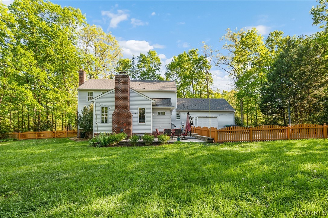13724 Queensgate Road Midlothian, VA 23114 - Photo 28 of 48 a front view of a house with a yard and trees