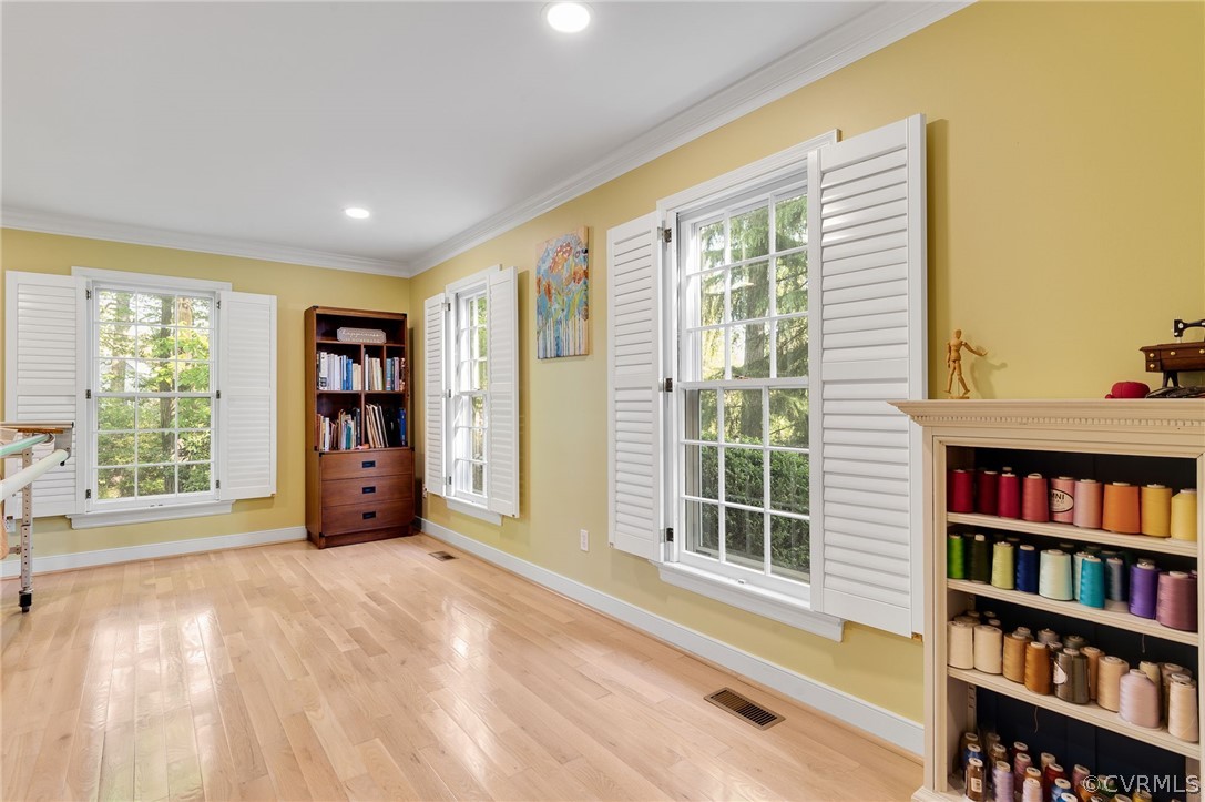 13724 Queensgate Road Midlothian, VA 23114 - Photo 5 of 48 a view of an empty room with a window and a kitchen