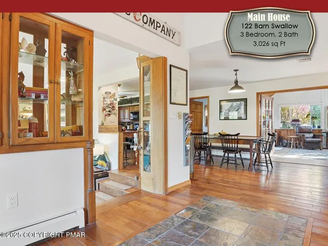 a bedroom with bed and window