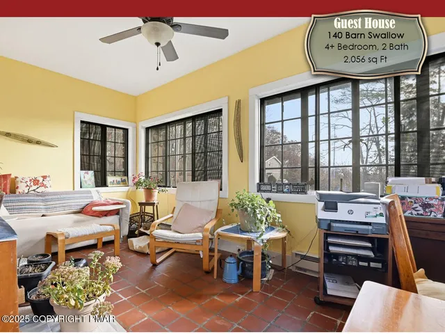 a view of a chairs and tables in patio