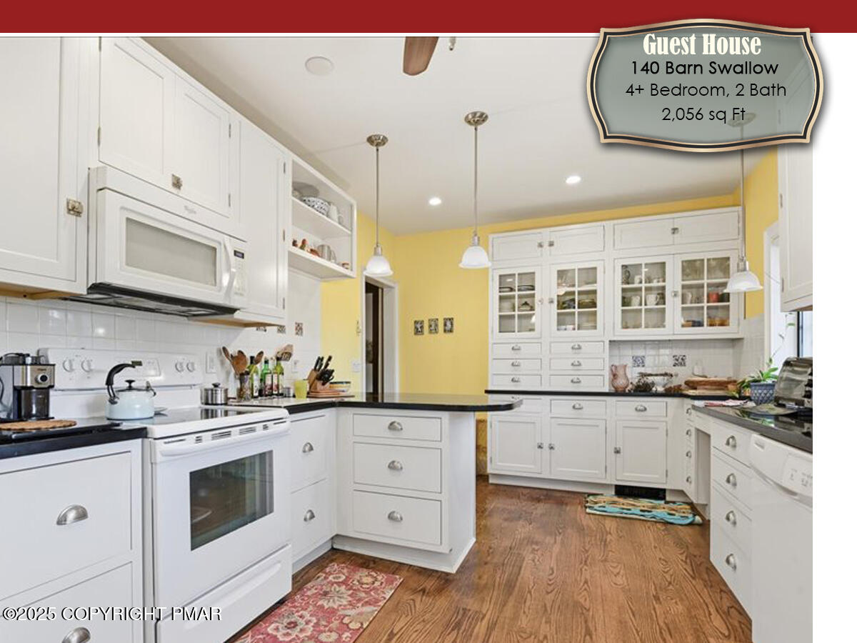 130 Barn Swallow Lane Cresco, PA 18326 - Photo 34 of 75 a kitchen with stainless steel appliances a stove a sink and cabinets