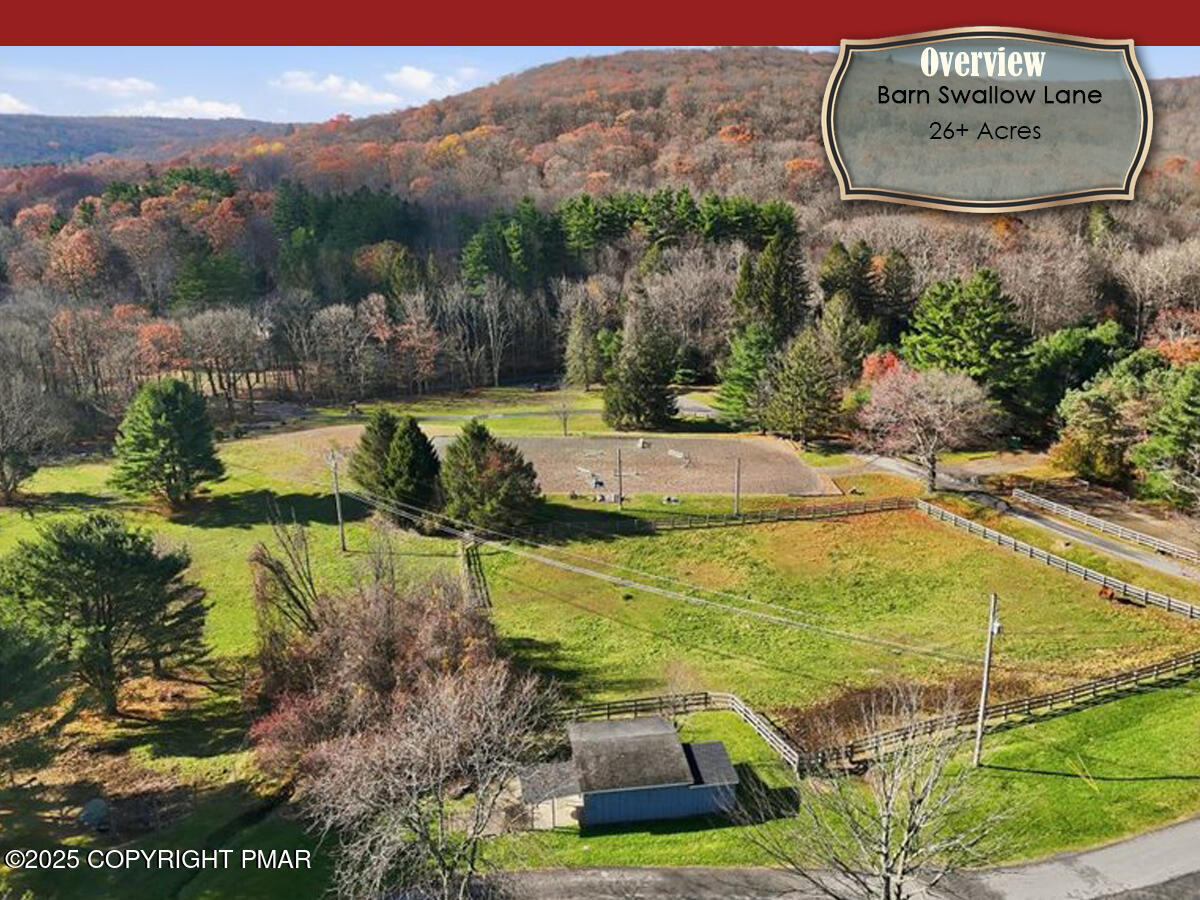 130 Barn Swallow Lane Cresco, PA 18326 - Photo 73 of 75 a view of a swimming pool with a yard