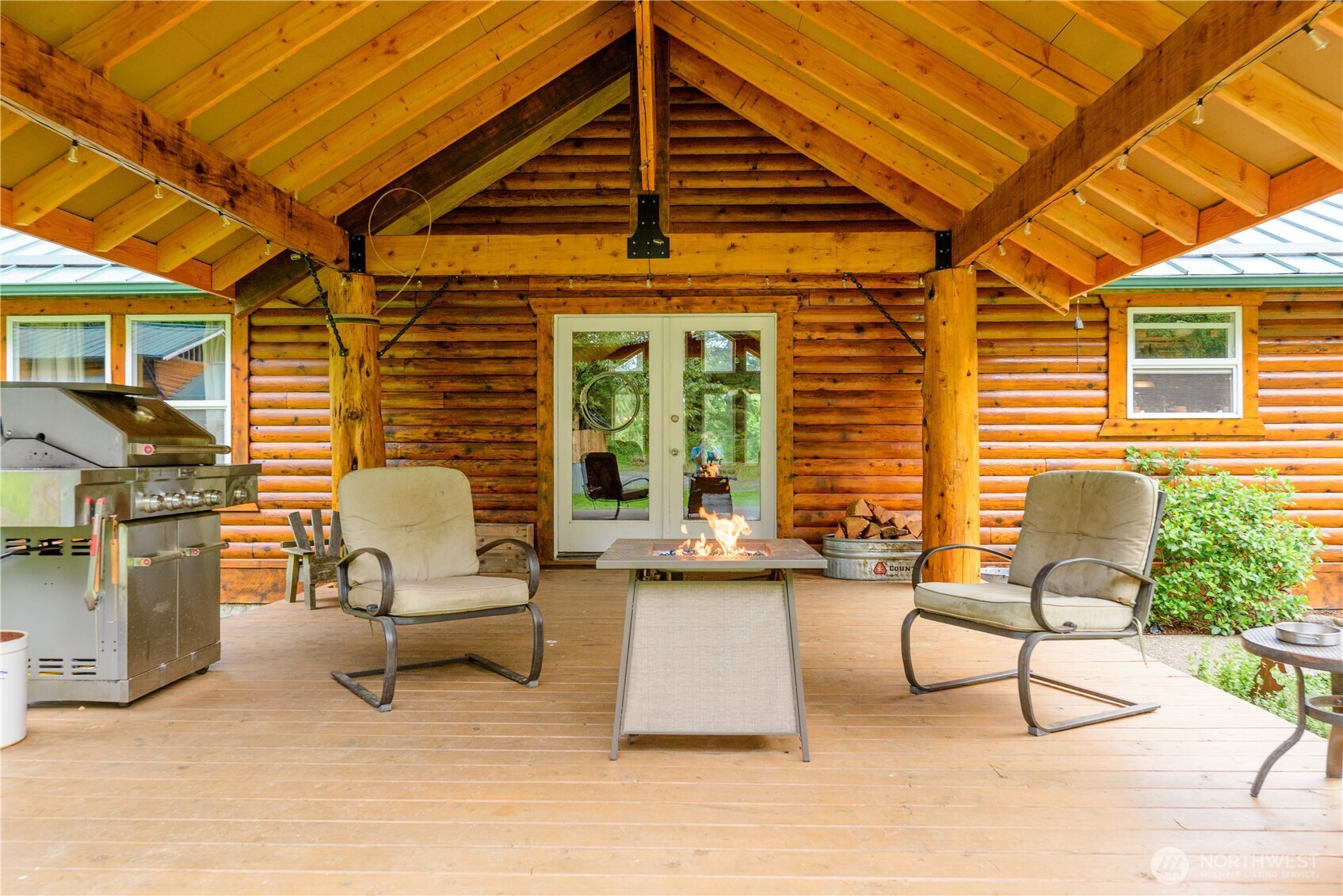 134 Bishop Road Port Angeles, WA 98363 - Photo 5 of 38 a view of a chairs and table in a patio