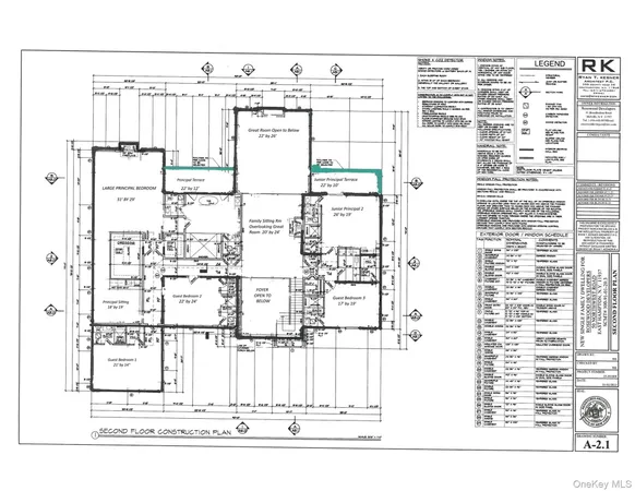 a black and white photo of a living room