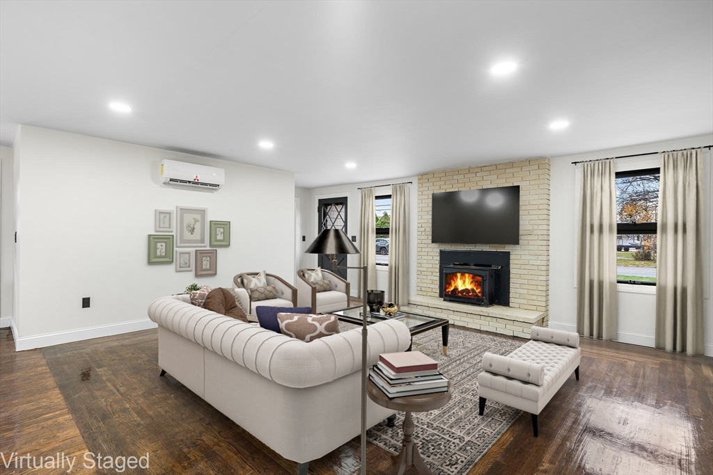 195 Barney Avenue Rehoboth, MA 02769 - Photo 1 of 37 a living room with furniture and a flat screen tv