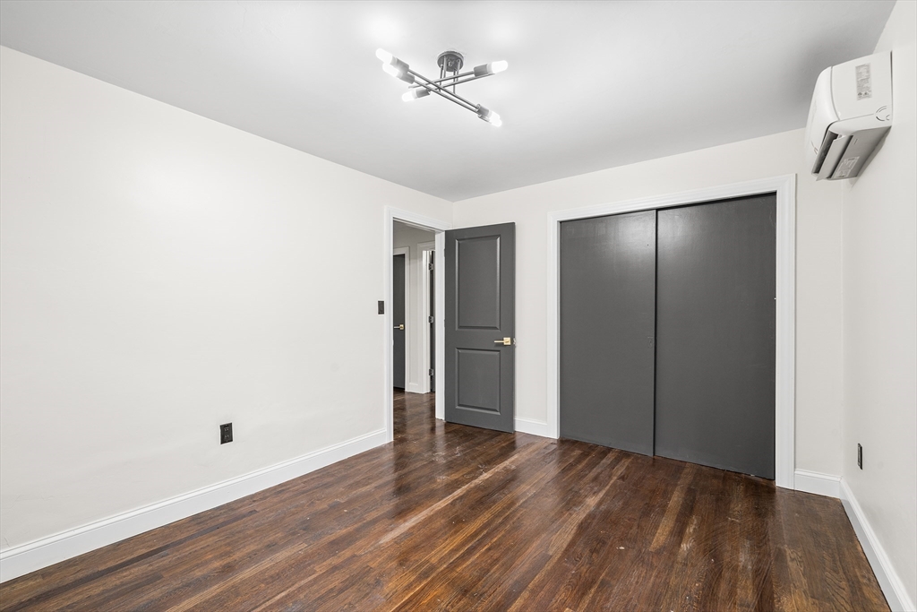 195 Barney Avenue Rehoboth, MA 02769 - Photo 17 of 37 a view of an empty room with wooden floor