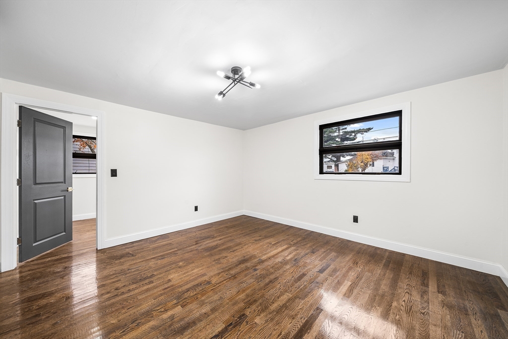 195 Barney Avenue Rehoboth, MA 02769 - Photo 21 of 37 a view of empty room with wooden floor