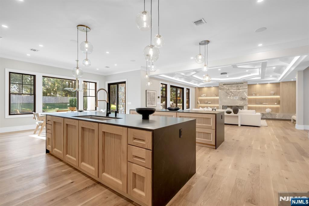 12 Echo Ridge Road Upper Saddle River, NJ 07458 - Photo 13 of 49 a kitchen with counter top space and wooden floor