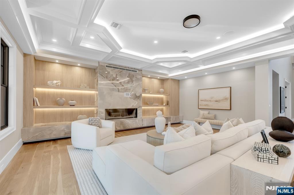 12 Echo Ridge Road Upper Saddle River, NJ 07458 - Photo 22 of 49 a living room with furniture and a large window