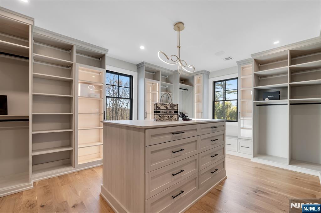 12 Echo Ridge Road Upper Saddle River, NJ 07458 - Photo 28 of 49 a room with a cabinets and a window