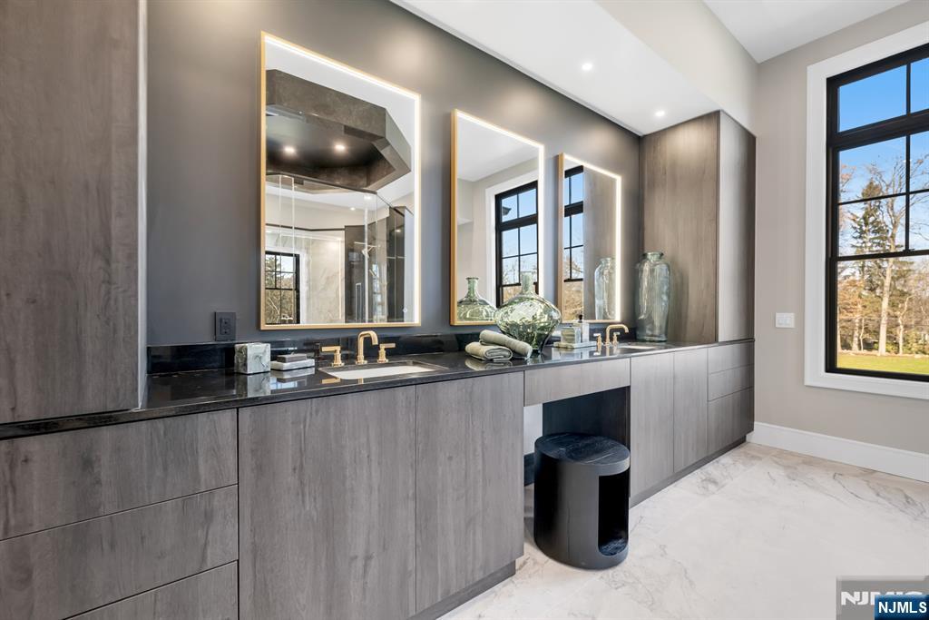 12 Echo Ridge Road Upper Saddle River, NJ 07458 - Photo 30 of 49 a bathroom with a bathtub and a sink