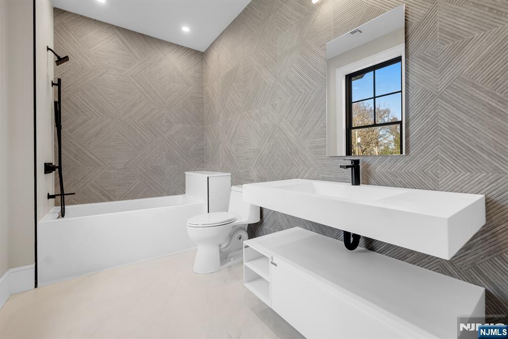 12 Echo Ridge Road Upper Saddle River, NJ 07458 - Photo 40 of 49 a bathroom with a sink toilet and shower