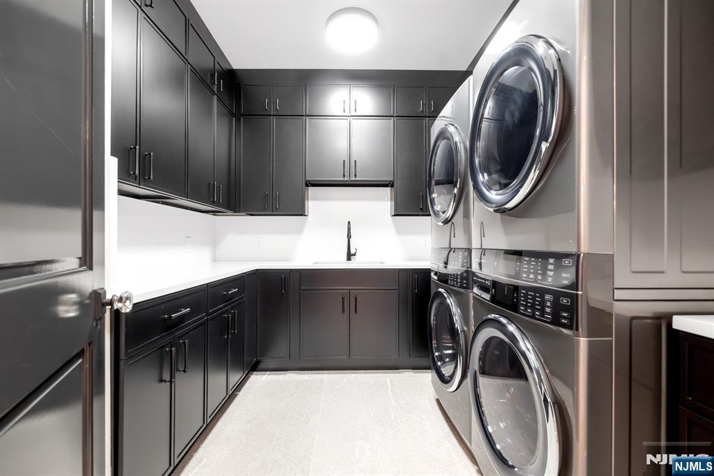 12 Echo Ridge Road Upper Saddle River, NJ 07458 - Photo 41 of 49 a utility room with sink dryer and washer