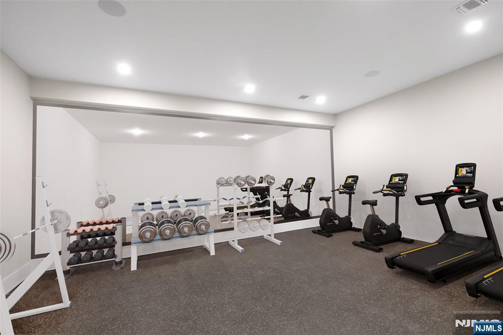 12 Echo Ridge Road Upper Saddle River, NJ 07458 - Photo 44 of 49 a view of a room with gym equipment
