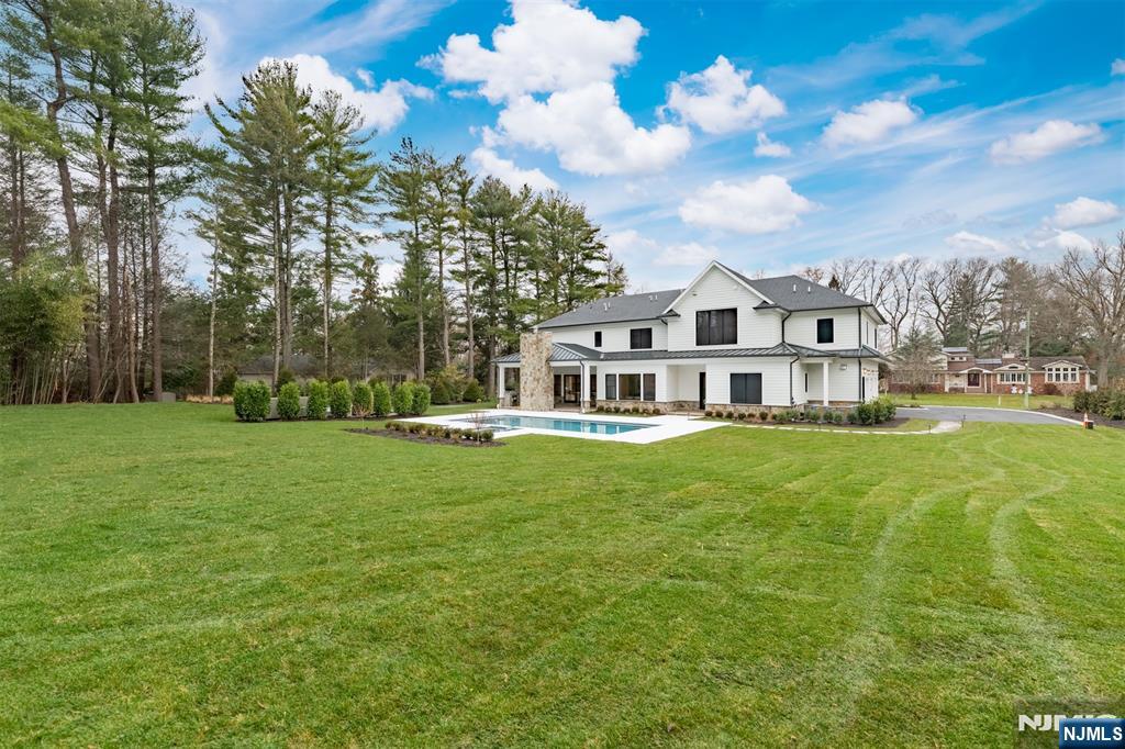 12 Echo Ridge Road Upper Saddle River, NJ 07458 - Photo 45 of 49 a view of a house with a big yard