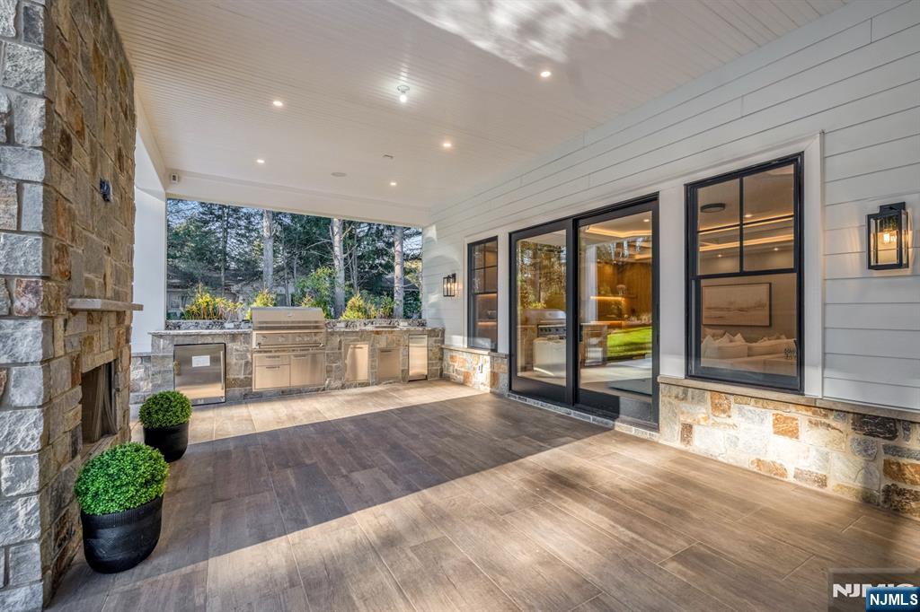 12 Echo Ridge Road Upper Saddle River, NJ 07458 - Photo 46 of 49 a living room with large windows