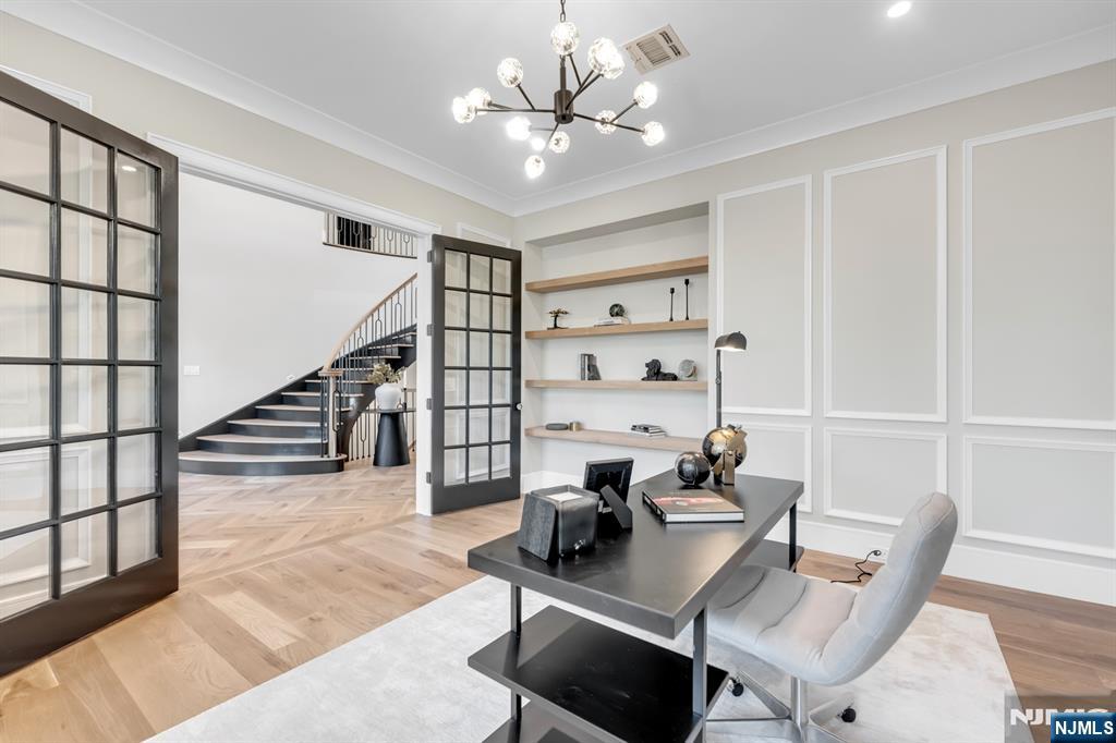 12 Echo Ridge Road Upper Saddle River, NJ 07458 - Photo 8 of 49 a view of a workspace with furniture and a living room