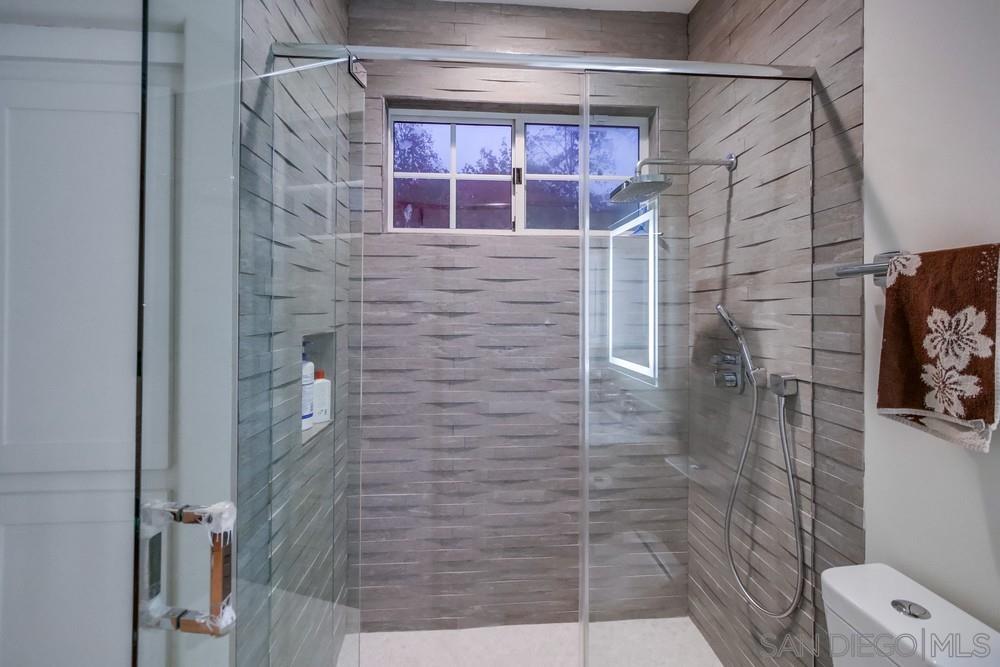 4124 Stonebridge Lane Rancho Santa Fe, CA 92091 - Photo 24 of 38 a bathroom with a shower