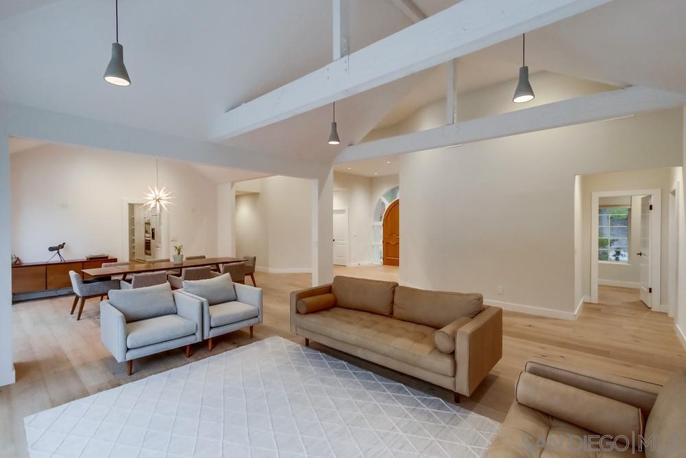 4124 Stonebridge Lane Rancho Santa Fe, CA 92091 - Photo 9 of 38 a living room with furniture and a couch