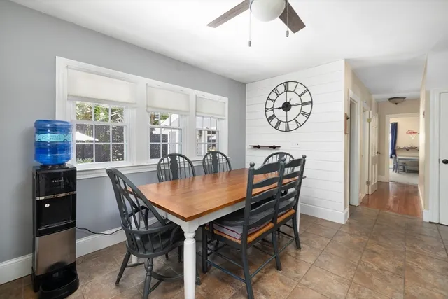 a view of a dining room and livingroom with furniture