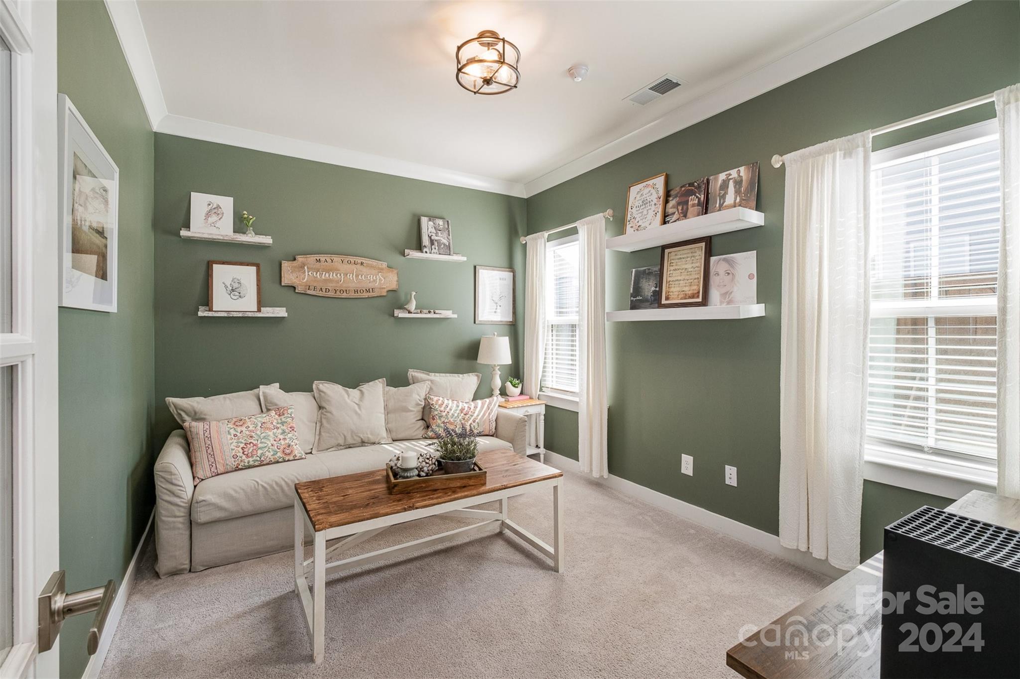6202 Holland Street Fort Mill, SC 29707 - Photo 18 of 39 a living room with furniture and a window