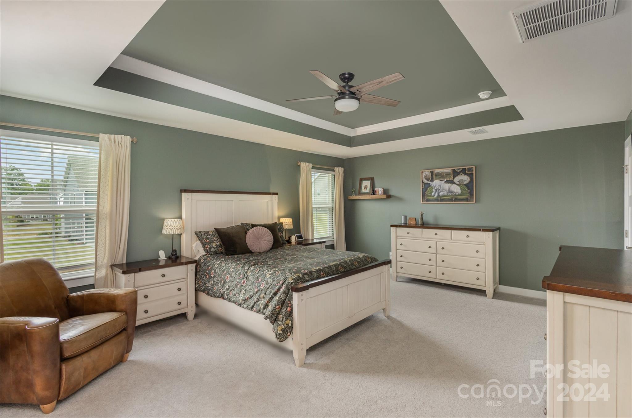 6202 Holland Street Fort Mill, SC 29707 - Photo 20 of 39 a bedroom with a bed couch and window