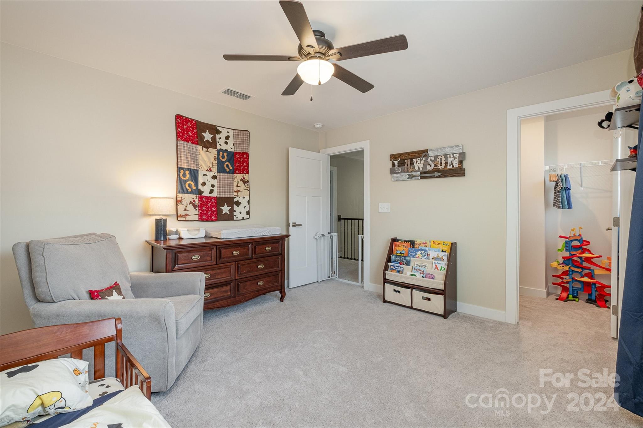 6202 Holland Street Fort Mill, SC 29707 - Photo 26 of 39 a bedroom with furniture and a bed