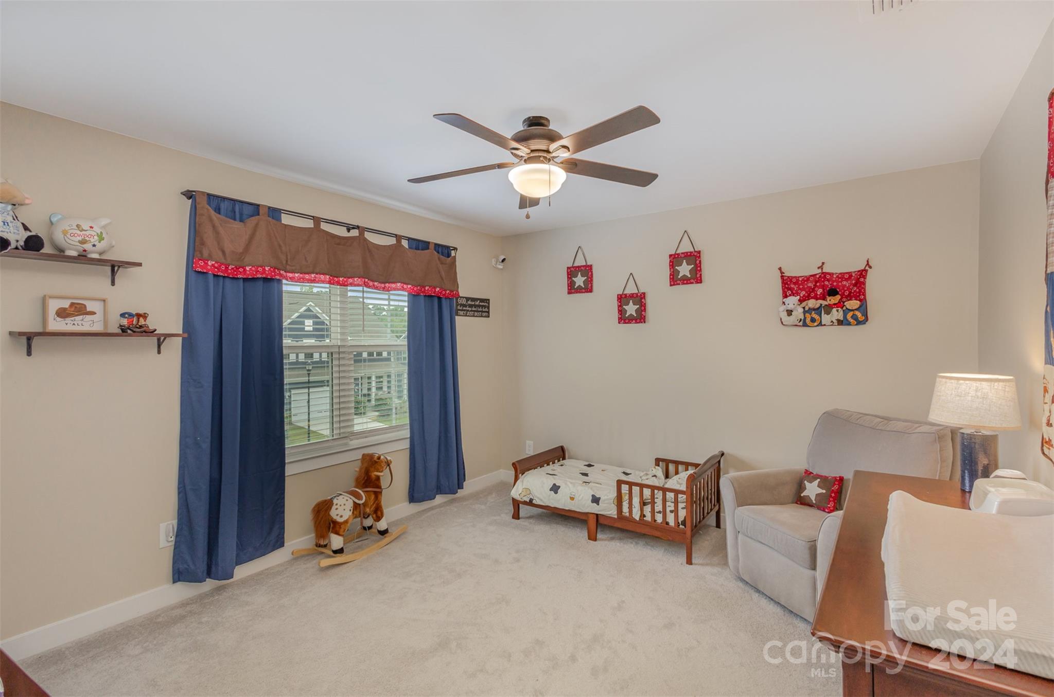 6202 Holland Street Fort Mill, SC 29707 - Photo 27 of 39 a living room with furniture and a window