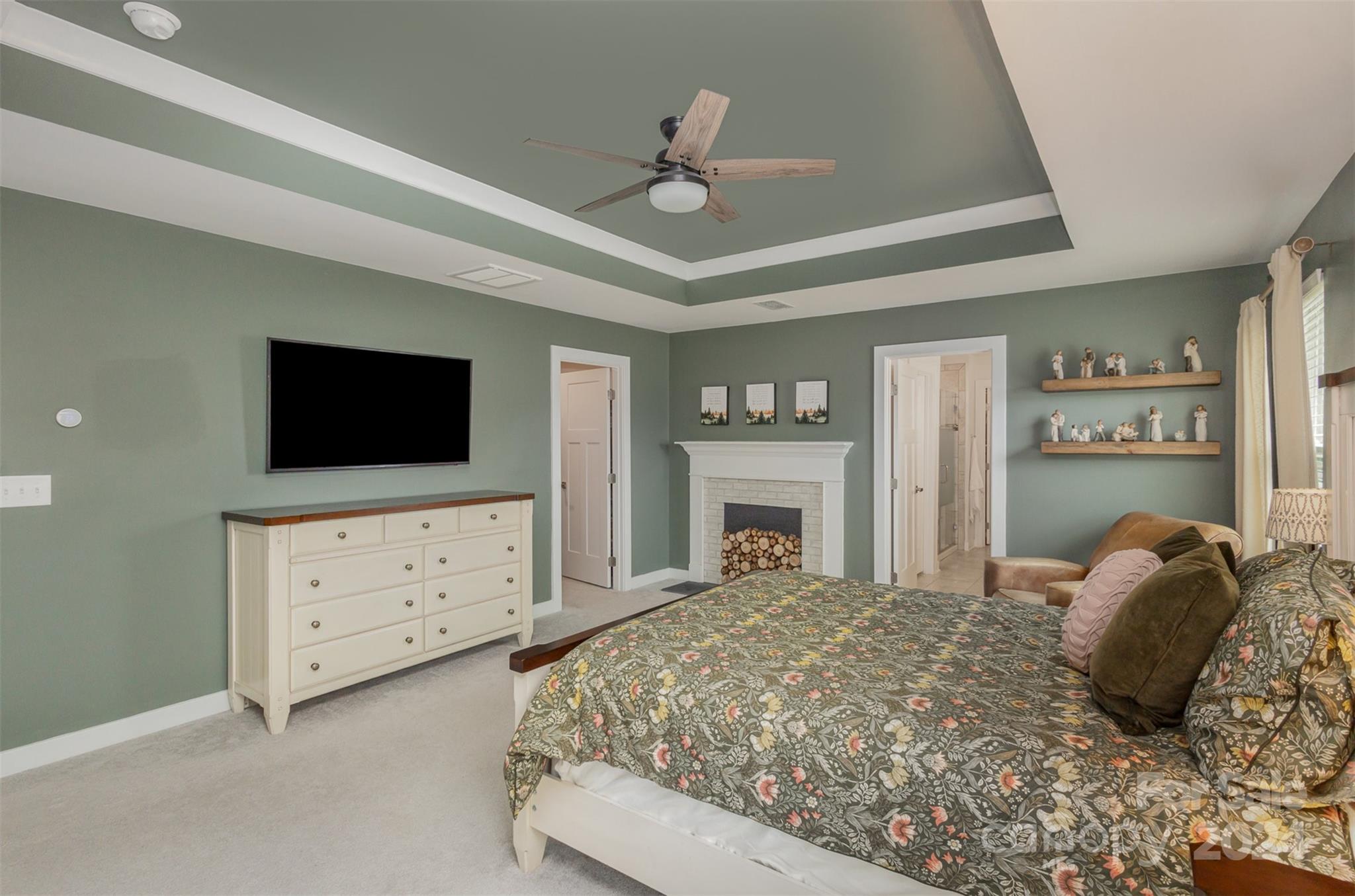 6202 Holland Street Fort Mill, SC 29707 - Photo 33 of 39 a bedroom with a bed and a flat screen tv