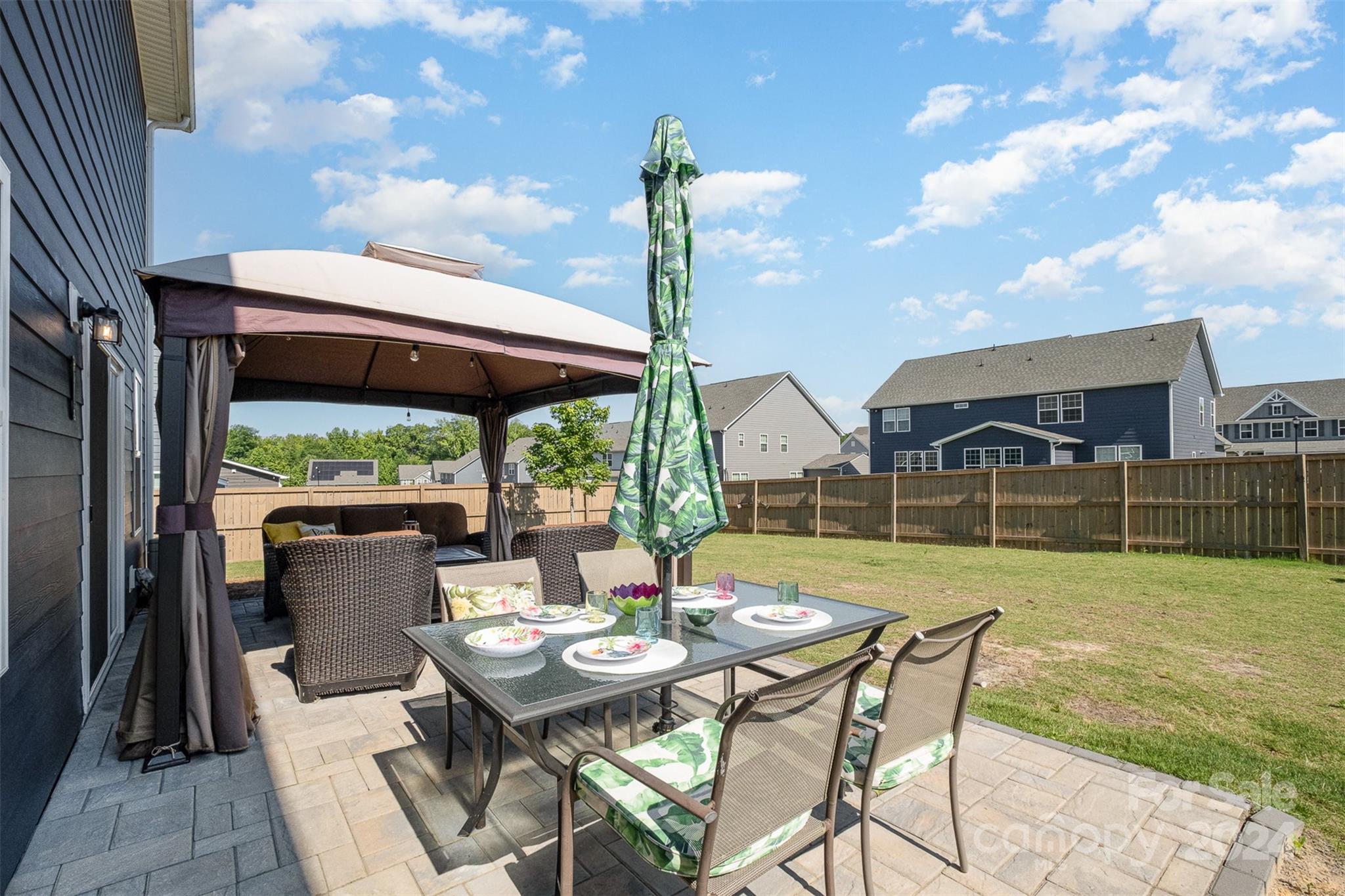 6202 Holland Street Fort Mill, SC 29707 - Photo 36 of 39 a view of an chairs and table in the patio
