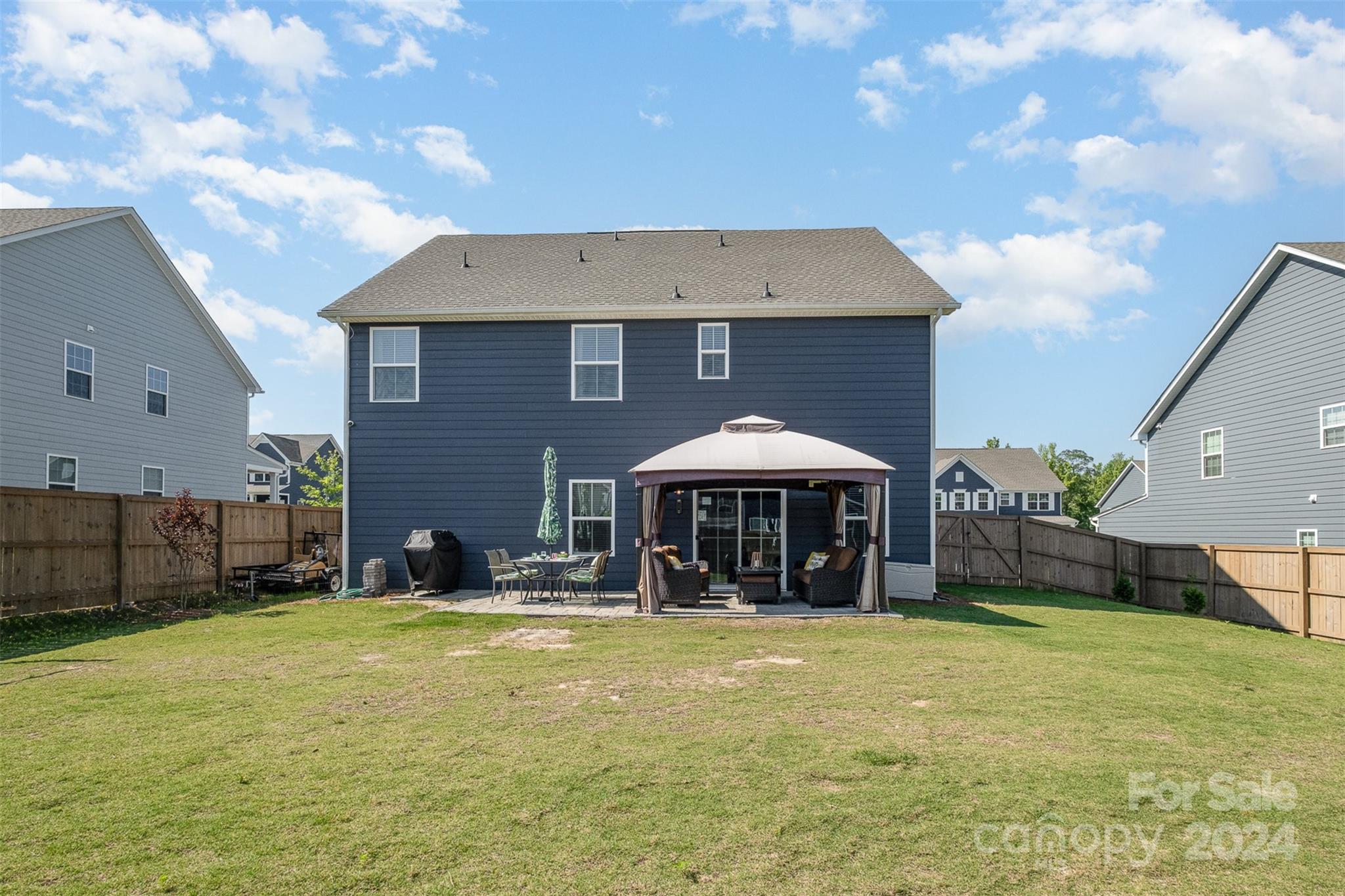 6202 Holland Street Fort Mill, SC 29707 - Photo 37 of 39 a view of a house with swimming pool and porch with furniture