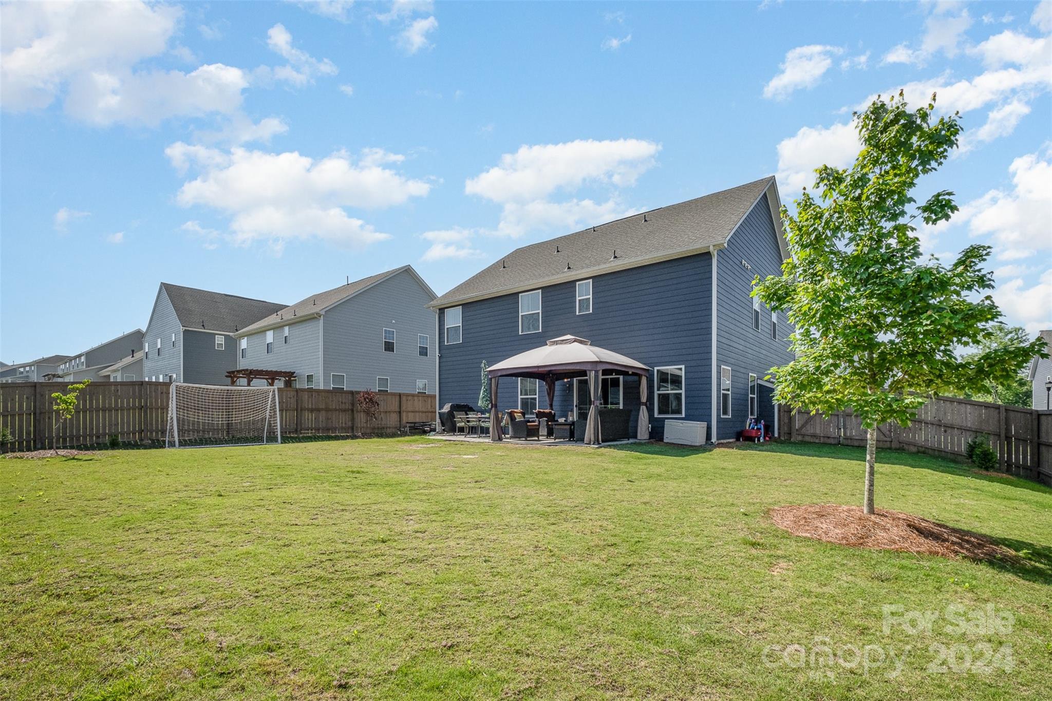 6202 Holland Street Fort Mill, SC 29707 - Photo 38 of 39 a view of a house with a yard and trees