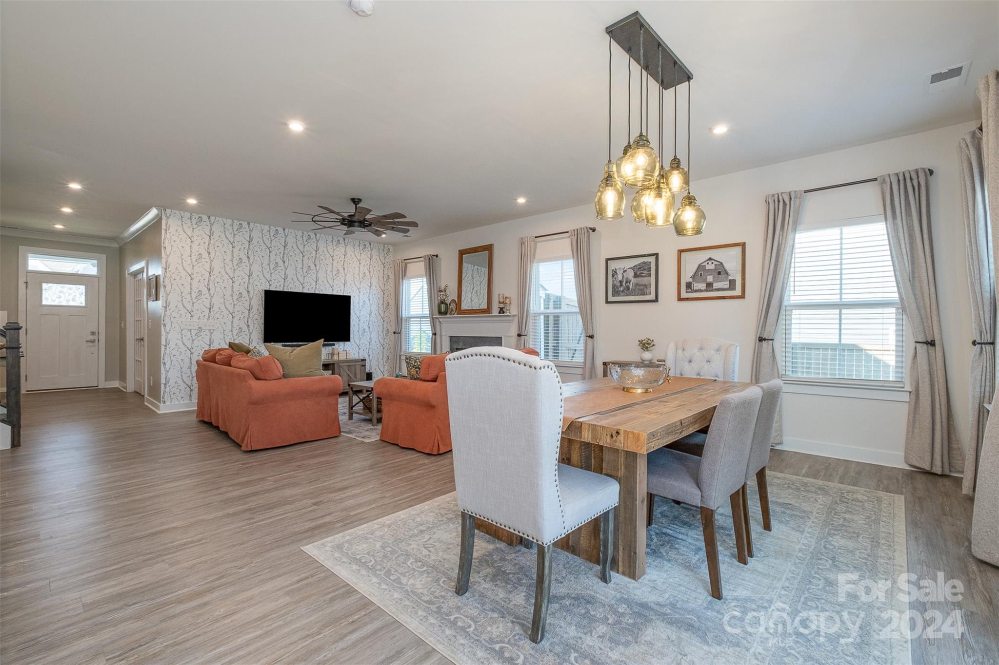 6202 Holland Street Fort Mill, SC 29707 - Photo 8 of 39 a view of a dining room with furniture window and wooden floor