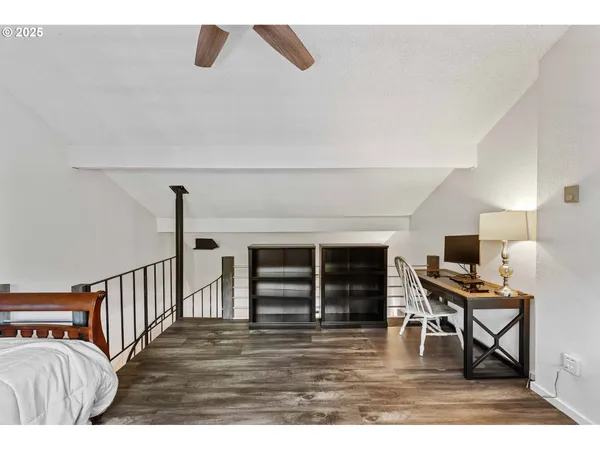 a view of a livingroom with furniture and window