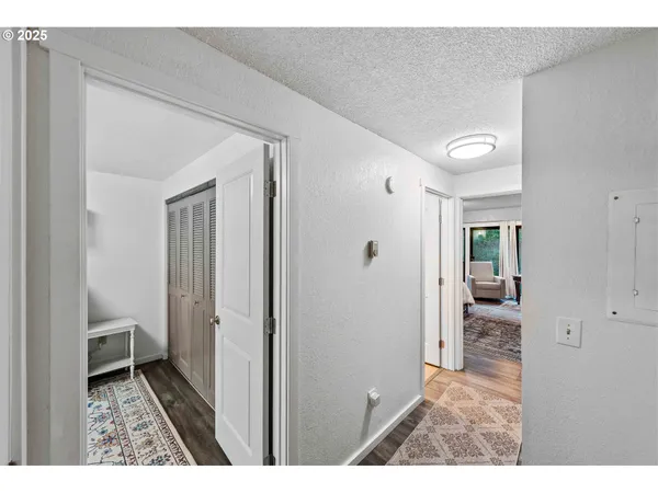 a view of a bathroom from a hallway